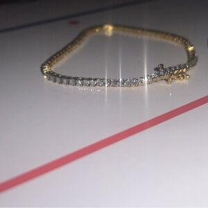 Elegant Gold and Silver Bracelet